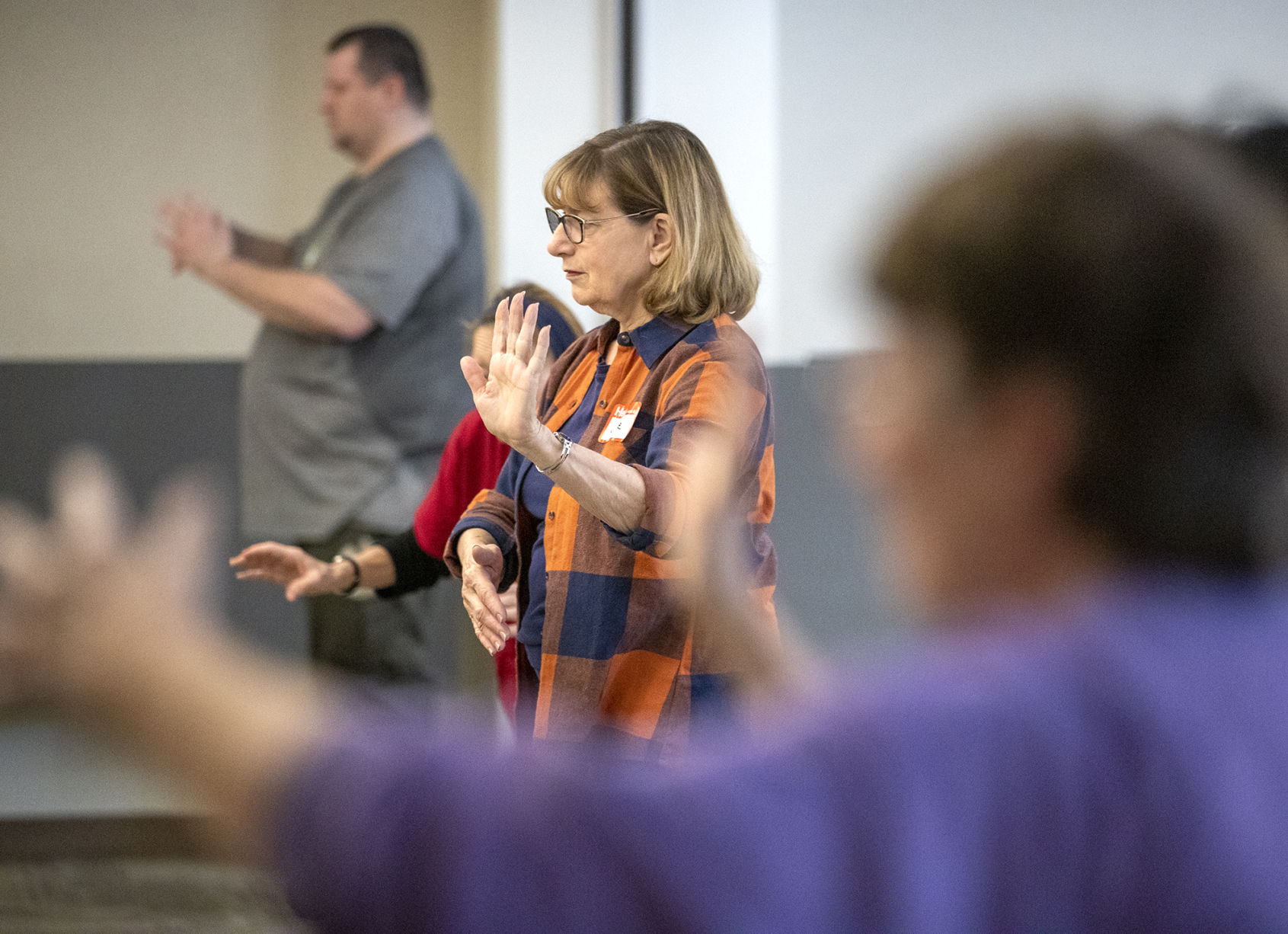 June Feller learns Tai Chi for Rehabilitation at the library